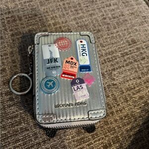 Michael Kors Silver Mini Bag with Travel Stickers